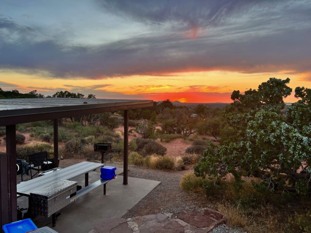 View of the sunset from the covered shelter at my campsite.