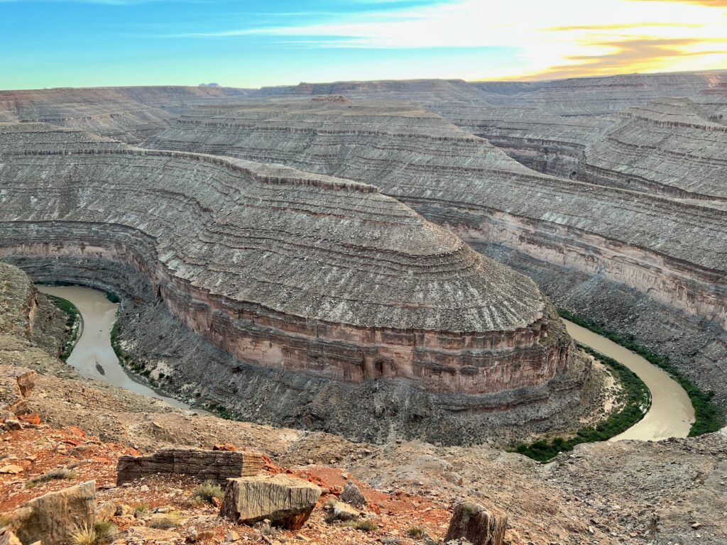 View of the San Juan River from the edge of a campsite cliff.