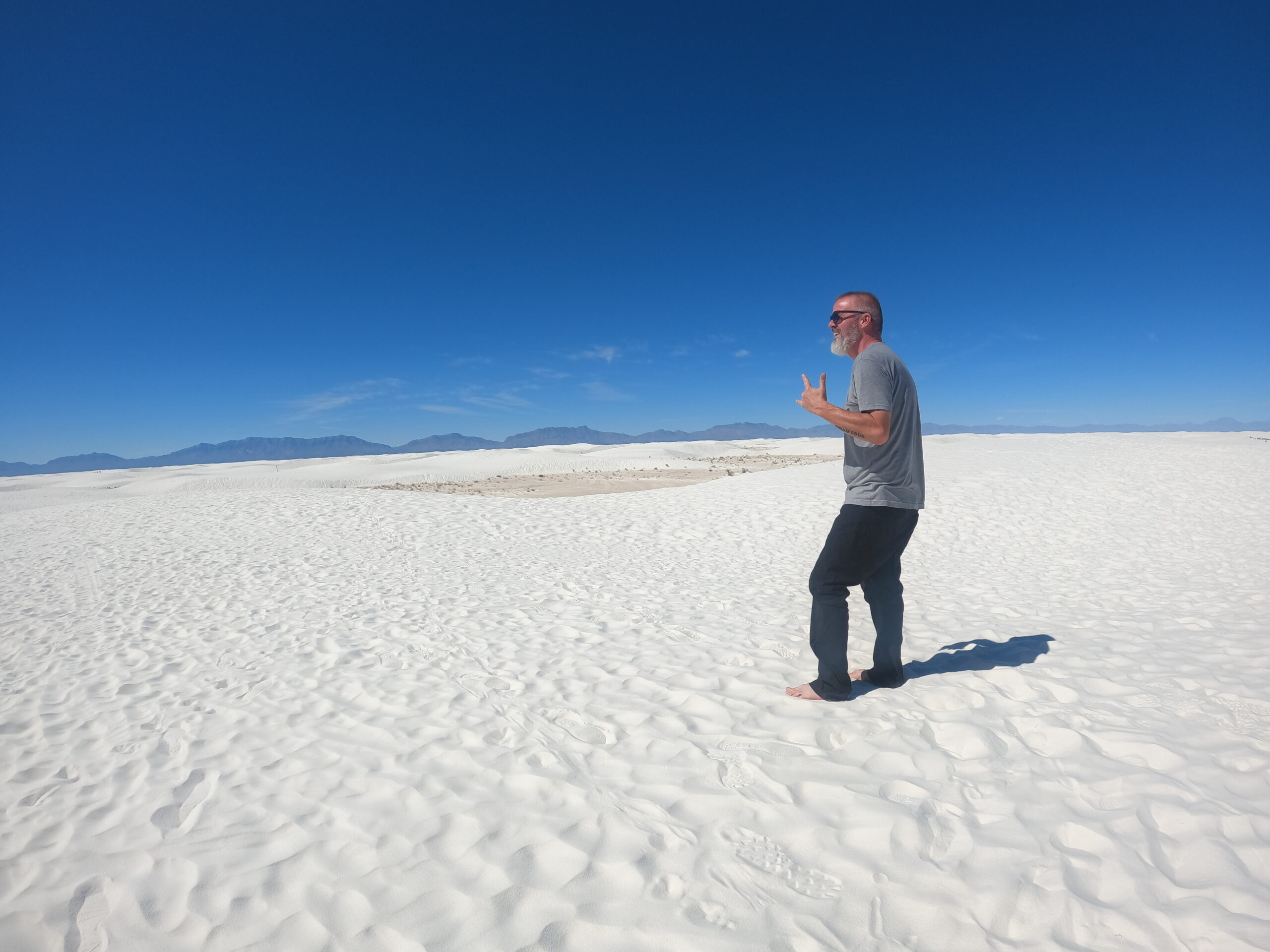 Walking barefoot across gypsum dunes at White Sands National Park